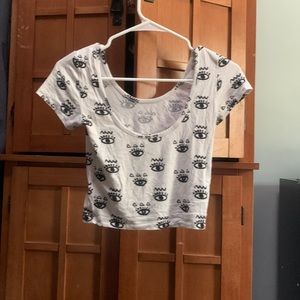 white eye covered crop top